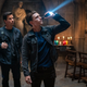 Drake and Sully are seen looking at something in an underground crypt in the Uncharted movie.